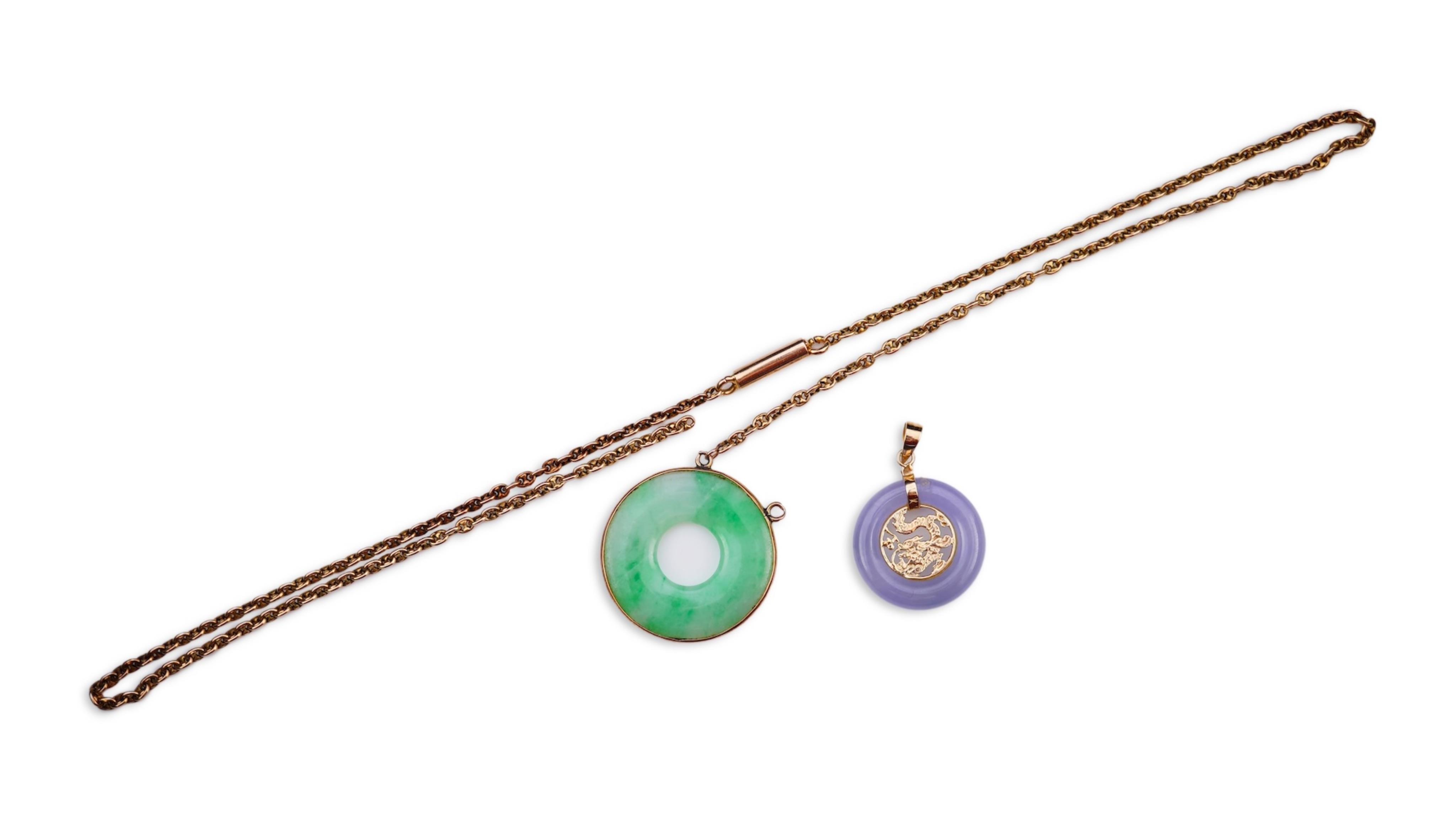 Two jadeite pendants